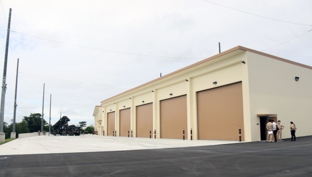 Patriot Missile launchers rest beside the newly opened Patriot Missile Storage Facility in Okinawa, Japan. The state-of-the-art facility allows U.S. Army Japan to react faster than ever before to threats in the region.