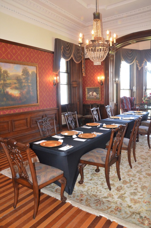 The dining room originally featured a massive walnut dining table able to seat up to 15 guests and was built by Arsenal craftsmen in 1878. Today’s furnishings are smaller and more modern, yet still elegant, as shown at a recent luncheon setting.