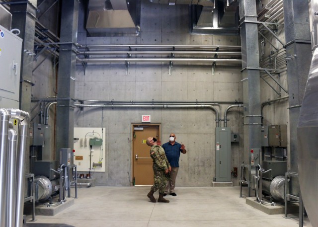 Col. Thomas J. Verell, Jr., is given a tour of the newly opened Patriot Missile Storage Facility in Okinawa, Japan. The facility is designed to control both temperature and humidity, keeping missiles ready to go at a moment's notice.