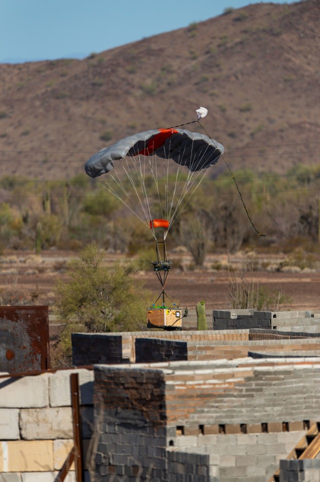 U.S. Army Yuma Proving Ground (YPG) is home to all manner of parachute testing, with spacious and instrumented ranges large enough to accommodate even the world’s largest cargo parachutes.

The post has long been on the cutting edge of new airdrop capabilities, and recently wrapped up the Autonomous Aerial Insertion and Resupply into Dense Urban Complex Terrain (AAIRDUCT) Joint Capability Technology Demonstration. Involving the precision delivery of payloads of between 50 pounds and 2,400 pounds to units in urban environments, YPG’s extensive evaluations of the system included utilizing an existing mock urban complex into a new drop zone.