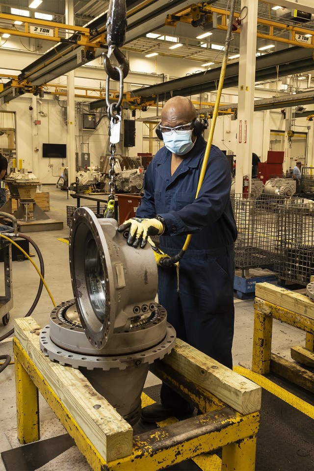 Nathaniel Williams, a heavy mobile equipment mechanic, disassembles a final drive for the M1 Abrams in the Final Drive Branch at Anniston Army Depot.