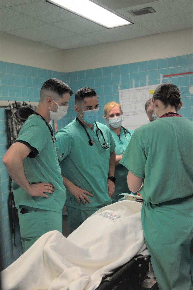 Students from the Interservice Physician Assistant Program rehearse trauma scenarios at the General Leonard Wood Army Community Hospital May 14.