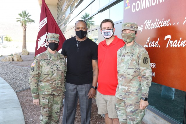 (From L-R) Weed Army Community Hospital Commander, Col. Nancy Parson, husband, Darryl Parson, Bryce Brown and wife, Maj. Susan Brown.
Civilian male spouses may not feel the different "Mommy and Me-type" groups are all inclusive but group leaders say all are welcome.
According to Military One Source, 47% of 70,000 women in the Army are married—the highest of all the services. Of that number, 36% of those marriages were dual military couples where both married parties were active-duty members of the Army.
That means the number of male spouses married to an active-duty, female servicemember is approximately 11%, according to a breakdown on the Demographics Profile of the Military Community.