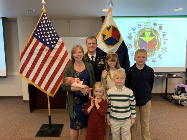 Lt. Col. Jim Nemec poses with wife, Lindsay Nemec and five children.