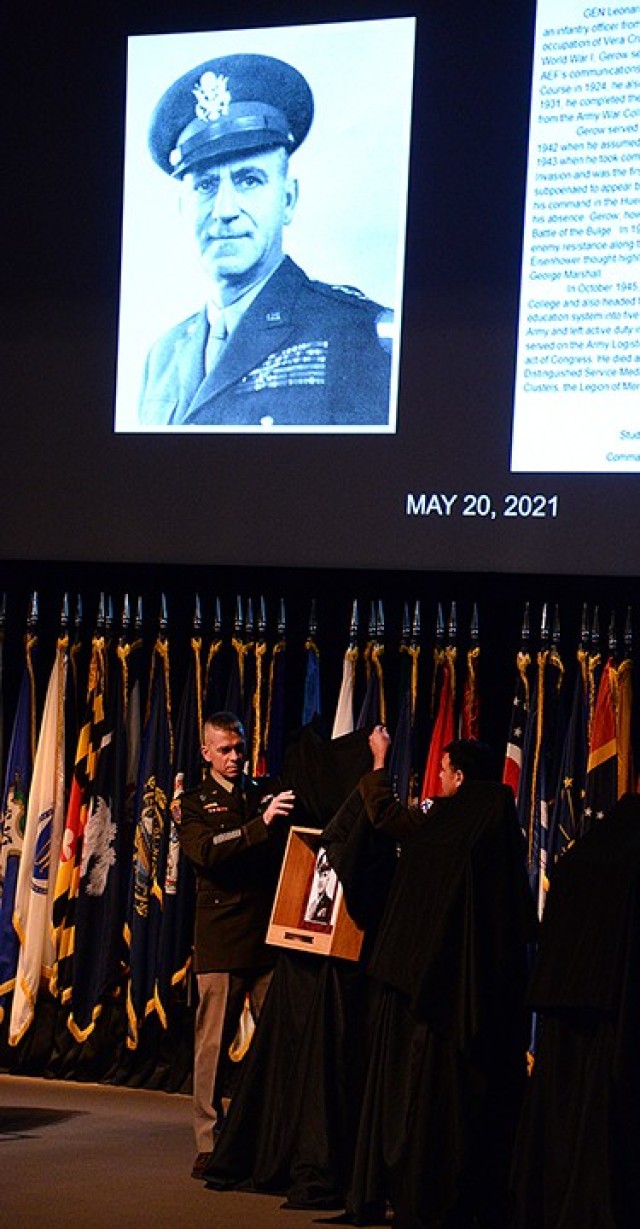 Maj. Gen. Donn Hill, , deputy commanding general for education, Combined Arms Center, and Chaplain (Maj.) Jonathan Bailey, ethics instructor for the Command and General Staff School, unveil Gen. Leonard Gerow's Fort Leavenworth Hall of Fame...