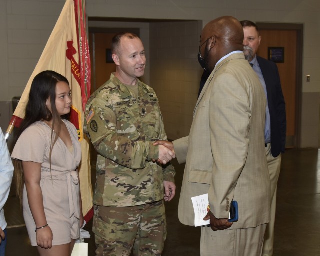 Mayor Van Johnson of Savannah welcomes Command Sgt. Maj. Ryan C. Reichard as the new garrison senior enlisted advisor after change of responsibility ceremony, May 25. (Photo by Chris Rich)