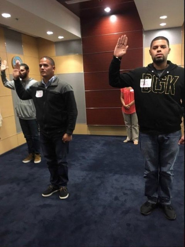 Sgt. Manuel Cortes (left) and Spc. Hector Quinones saying their oath together in 2018 and 2021.