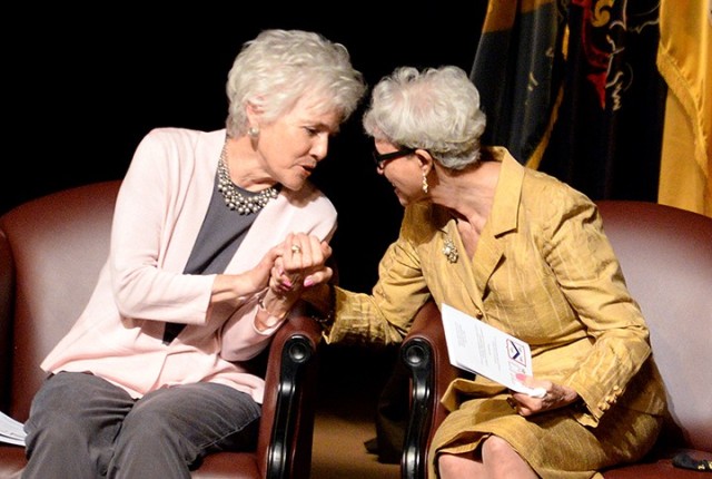 Mary Beth Brown, niece of Fort Leavenworth Hall of Fame inductee Brig. Gen. Elizabeth Hoisington, commends Hall of Fame inductee retired Brig. Gen. Sherian Cadoria after Cadoria's remarks during the Hall of Fame induction ceremony for Hoisington,...