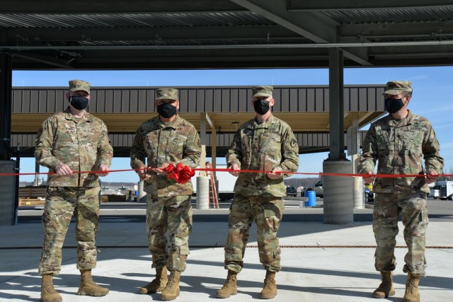 Col. Damon Delarosa, U.S. Army Corps of Engineers – Alaska District commander, visits participated in a ribbon-cutting ceremony for a new petroleum, oil and lubricants (POL) operations facility on Joint Base Elmendorf-Richardson. Delarosa assumed command in August as the first Asian American to hold the position, encouraging his staff to be bold and lean forward into the future of arctic engineering. Cutting the ribbon from left to right is Master Sgt. James Hoskins, fuels superintendent for the 673d Logistics Readiness Squadron; Brig. Gen. Jimmy R. Canlas, commander of the Defense Logistics Agency; Col. Dean Denter, Joint Base Elmendorf-Richardson and 673d Air Base Wing vice commander; and Col. Damon Delarosa, Alaska District commander.