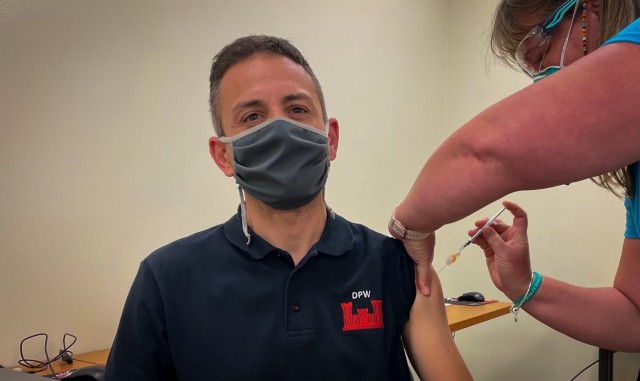 Nicola Zancan, an employee for DPW, Road Zone and Group section,  receives his first dose of the Pfizer vaccine. “I wish to go back to normal soon, without a mask. I am happy to be here to receive a vaccine” USAHC-Vicenza provided an opportunity for host nation professionals, including contractors, to receive their anti-COVID vaccines May 25, 2021.