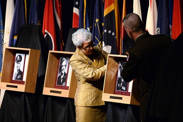 Fort Leavenworth Hall of Fame inductee retired Brig. Gen. Sherian Cadoria, 1971 Command and General Staff College graduate, and Maj. Gen. Donn Hill, deputy commanding general for education, Combined Arms Center, unveil Cadoria's Hall of Fame...