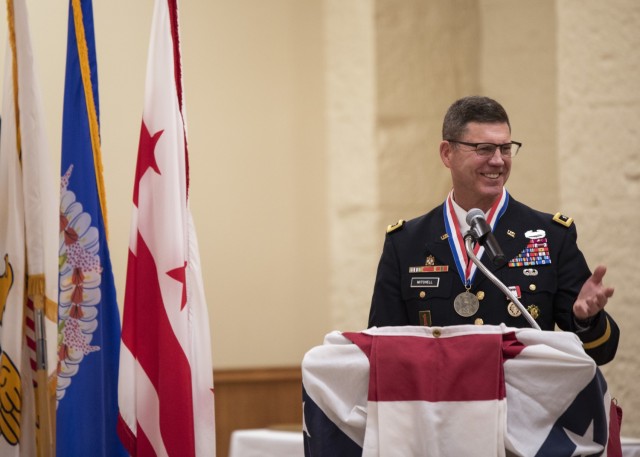 Maj. Gen. Daniel Mitchell shares a laugh as he speaks during his retirement ceremony May 27. Mitchell also relinquished command of the U.S. Army Sustainment Command during the ceremony. (Photo by Linda Lambiotte, ASC Public Affairs)