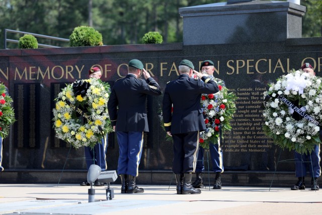 U.S. Army Soldiers unveil the names of fallen Special Operations Forces on the U.S. Army Special Operations Command Memorial Wall during a ceremony at the USASOC Memorial Plaza on May 27, 2021. 

(U.S. Army photo by: Spc. Ramon Wright)