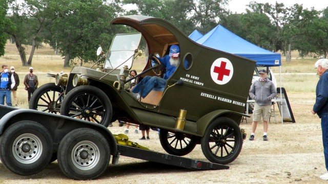 Member of the Estrella Warbird Museum offloading their restored World War I Army ambulance as part of the vehicle displays for Fort Hunter Liggett's 80th Anniversary Open House, May 15, 2021.
