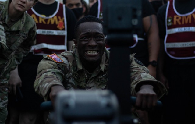 Sgt. Emmanuel Gooden, B/1-78th FA,  grits his teeth during the rowing event May 27, 2021, during the fitness challenge.  The eight team members had to  row 6,000 meters cumulatively.
