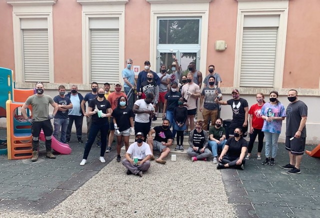VICENZA, Italy: Volunteers pose for a picture before taking part in a local kindergarten beautification project, helping paint a Quinto Vicentino preschool May 22, 2021. Approximately 20 volunteers from BOSS, Vicenza Sergeant Morales Club and other Vicenza military community members teamed with representatives of the local school.