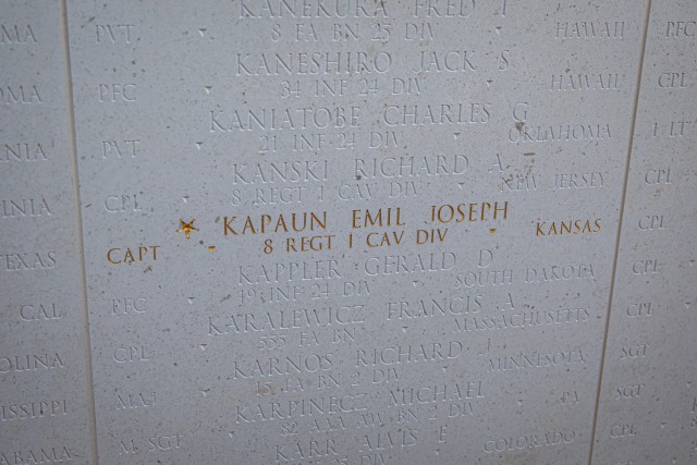 Capt. Joseph E. Kapaun’s name, a Medal of Honor recipient and chaplain for 8th Regiment, 1st Cavalry Division, is displayed at the National Memorial Cemetery of the Pacific May 11 at Punchbowl Crater in Honolulu, Hawaii. Maj. Gen. Tom Solhjem,  U.S. Army chief of chaplains, Regimental Sgt. Maj. Ralph Martinez, the Chaplain Corps senior enlisted advisor, and their spouses visits the memorial  to honor the memory of the nation’s military veterans and learn about previous chaplains that have sacrificed their lives during the wars. (U.S. Army photo by Sgt. 1st Class Monik M. A. Phan, U.S. Army Pacific Public Affairs)