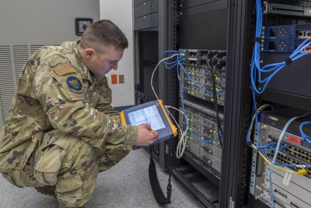 Air Force Tech. Sgt. Nicholas Respondek, a client systems services specialist with the 14th Communications Squadron, performs a cyber threat test on communications circuits at the Niagara Falls Air Reserve Station, N.Y., Feb. 8, 2020.