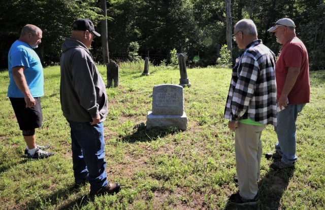 Wise brothers Lon, John and Michael visit Pitts Point Cemetery at Fort Knox on Memorial Day for the first time since their father brought them 51 years ago. Joined by brother Pat, the men have 17 family members buried at the site.