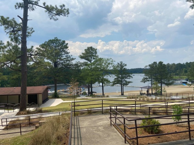 In alignment with the U.S. Army’s People First initiative, Fort Bragg’s Family, Morale, Welfare, and Recreation program added two new features at Smith Lake Recreation Area for Soldiers and Families to enjoy. Fort Bragg held the grand opening of the Smith Lake Outdoor Recreation Center with a ribbon-cutting ceremony and the re-opening of the beach, May 26.