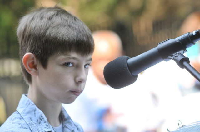 A visibly nervous 10-year-old Jake Sullivan gets set to speak to those gathered for the annual Butterfly Release event May 26 at the Army Community Service Memorial Garden. Sullivan called his father -- Army Sgt. 1st Class Brian Sullivan -- and...