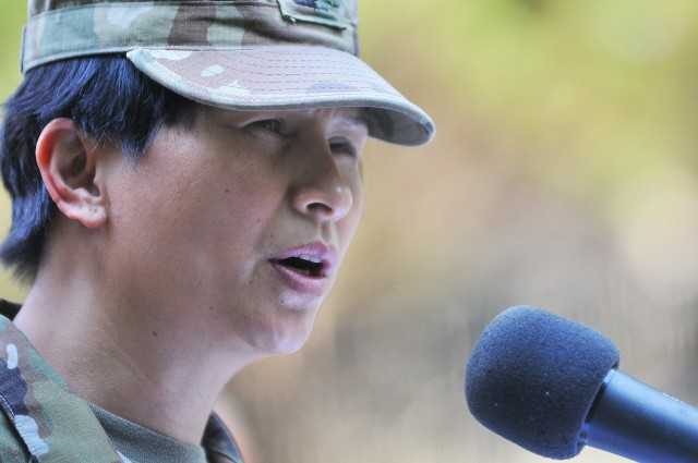 Col. Karin Watson, Garrison commander, speaks to those gathered for the annual Butterfly Release event May 26 at the Army Community Service Memorial Garden.