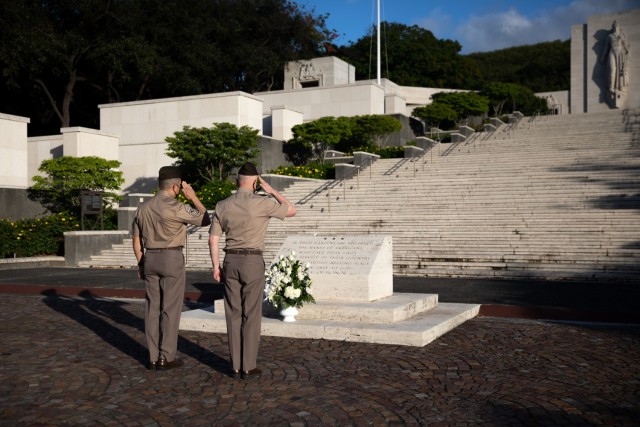Maj. Gen. Tom Solhjem, U.S. Army chief of chaplains, and Regimental Sgt. Maj. Ralph Martinez, the Chaplain Corps senior enlisted advisor, salutes the war memorial at the National Memorial Cemetery of the Pacific May 11 at Punchbowl Crater in Honolulu, Hawaii. Solhjem and Martinez cemetery visit was to honor the memory of the nation’s military veterans and learn about previous chaplains that have sacrificed their lives during the wars. (U.S. Army photo by Sgt. 1st Class Monik M. A. Phan, U.S. Army Pacific Public Affairs)