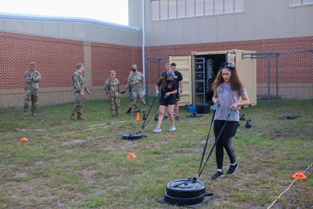 Spouses of 9th Brigade Engineer Battalion, 2nd Armor Brigade Combat Team, 3rd Infantry Division, conduct a portion of the Army Combat Fitness Test for the Spouse Spur Ride on May 27, 2021, at Fort Stewart, Georgia. The event allowed spouses an opportunity to experience a day in the life of their Soldier.