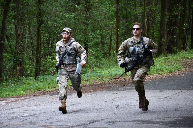 Spc. Jaycob Vellon-Colon from Letterkenny Army Depot (left) and Staff Sgt. Daron Ashcraft from the U.S. Army Aviation and Missile Command Aviation Center Logistics Command finish the land navigation strong May 11. The Soldiers took part in the...