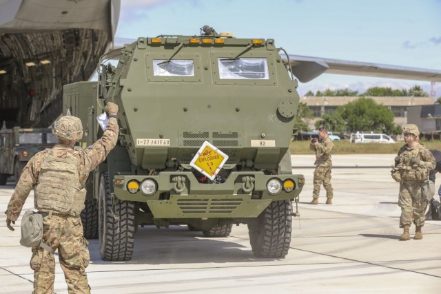 BEZMER AIR BASE, Bulgaria — A U.S. Army M142 High Mobility Artillery Rocket System assigned to 1st Battalion, 77 Field Artillery Regiment, 41st Field Artillery Brigade, exits a C-17 Globemaster III transport aircraft in preparation with the help...