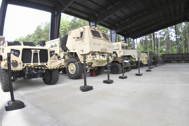 A view from one of the newest additions to the Army inventory – the Joint Light Tactical Vehicle  (far left) -- at the new Transportation pavilion located at the corner of 22nd Street and Railroad Avenue