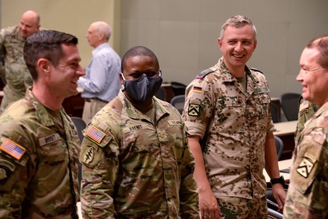 Iron Planner Award recipient Maj. Andy Bisset, Colonel Arthur D. Simons Center for the Study of Interagency Cooperation Writing Award recipient Maj. Samuel Haynes and Advanced Military Studies Program best monograph award recipient German Lt. Col....