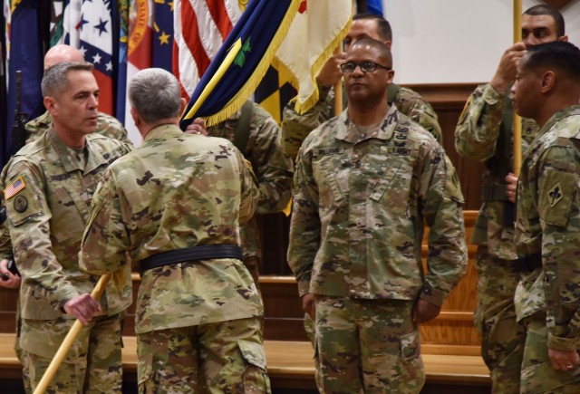 Col. Sean Crockett (left) accepts the U.S. Army Chemical, Biological, Radiological and Nuclear School colors from Maj. Gen. James Bonner, Maneuver Support Center of Excellence and Fort Leonard Wood commanding general, during a change-of-commandant ceremony June 4 in Lincoln Hall Auditorium, as outgoing commandant, Brig. Gen. Daryl Hood (right), and Regimental Command Sgt. Maj. Christopher Williams look on. Crockett assumes the role as the 32nd USACBRNS commandant, previously having served here as the USACBRNS assistant commandant, as well as 3rd Chemical Brigade commander.