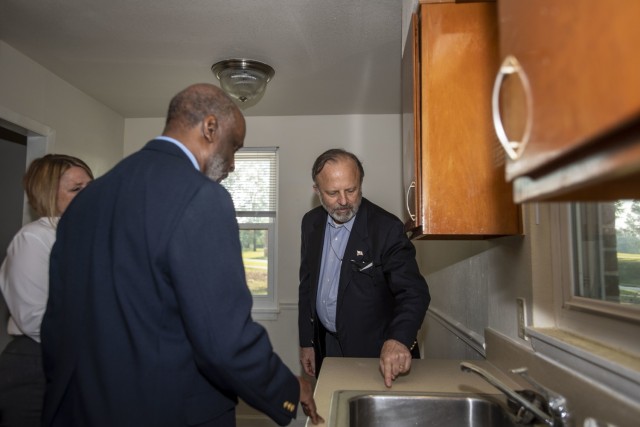 Jack Surash, Senior Official Performing the Duties of the Assistant Secretary of the Army (Installations, Energy & Environment), walks through a unit in Fort Jackson Family Homes during his visit to Fort Jackson May 28.