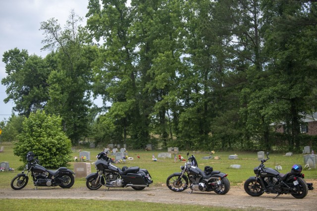 Motorcycles line the path at the Gates of Heaven Cemetary during the 165th Infantry Brigade Memoria Day Ride event May 28.
