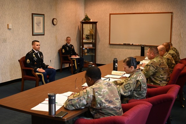 Staff Sgt. Ryan Columbare, a 42R musician and winner of the Combined Arms Support Command Noncommissioned Officer of the Year title, participates in the assessment board portion of the BWC event that took place May 23-27 at Fort Lee, Va. Columbare...