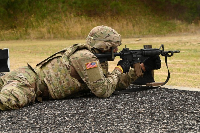 Specialist Jaleel Hunn, a 92A automated logistics specialist and winner of the Combined Arms Support Command Best Warrior of the Year title, qualifies at the rifle range on the second day of the BWC competition conducted at Fort Lee, Va. Hunn is a...