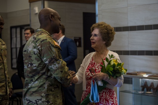 Fort Jackson Commander Brig. Gen. Milford H. ‘Beags’ Beagle Jr. greets Jo Lynn Allen after the dedication ceremony for the Maj. Gen. James B. Allen Jr. Hall May 27.