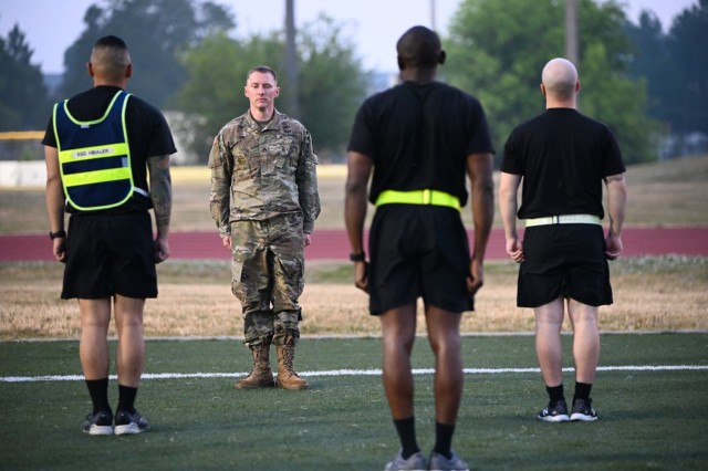 Staff Sgt. Cabot Cobb, an Army School of Music drill instructor and the Combined Arms Support Command Drill Sergeant of the Year, leads a group of Soldiers during the BWC Warrior Task and Battle Drills event that took place on May 26 at Fort...