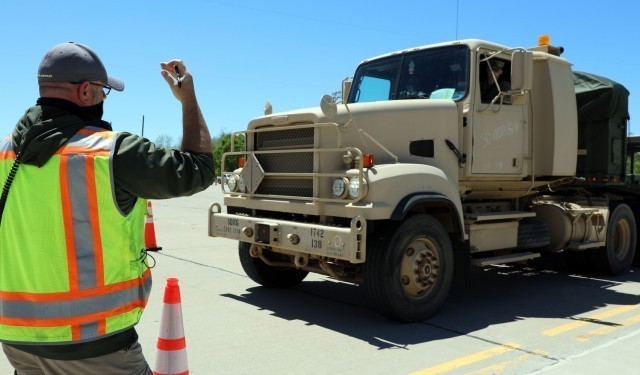Johnny King, Lead Engineering Equipment Operator on Blue Grass Army Depot, runs through the motor vehicle inspection checklist as tractor-trailer units and drivers from South Dakota’s 1742nd Transportation Company arrive for Operation Patriot...