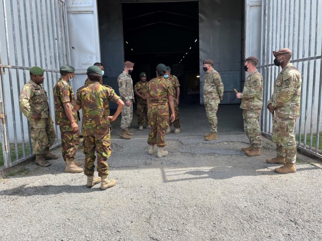 Lt. Col Noyamefa, a member of the Papua New Guinea Defense Force, facilitates a supply company warehouse brief to members of the 5th Security Force Assistance Brigade, May 24, 2021 at Murray Barracks, Papua New Guinea.  The team from 5th SFAB traveled to Papua New Guinea from Joint Base Lewis McChord, Washington in order to learn from the expert logisticians in the PNGDF and build a stronger relationship between the U.S. Army and Papua New Guinea's military forces.