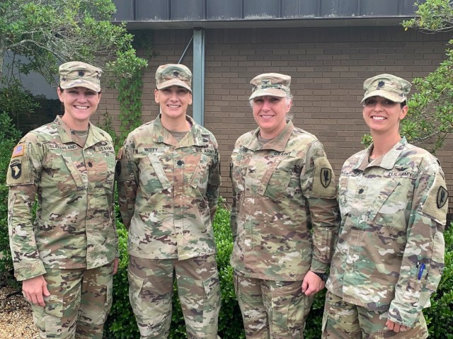 Women in command of the U.S. Army&#39;s 1st Aviation Brigade stand together at Fort Rucker, Alabama: Lt. Col. Katie Slingerland, 1st Battalion, 145th Aviation Regiment; Lt. Col. Erica Witty, 1st Battalion, 13th Aviation Regiment; Col. Tammy Baugh, 1st Aviation Brigade; and Lt. Col. Alissa McKaig, 2d Battalion, 13th Aviation Regiment.