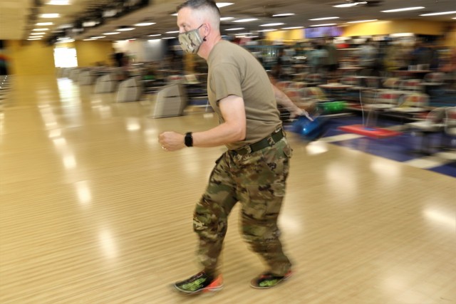 Col. Kenneth Haynes, Chief of Staff, 311th SC (T), takes aim at the bowling pins during a SAAPM Bowling Tournament at Fort Shafter, Hawaii, Apr. 22.