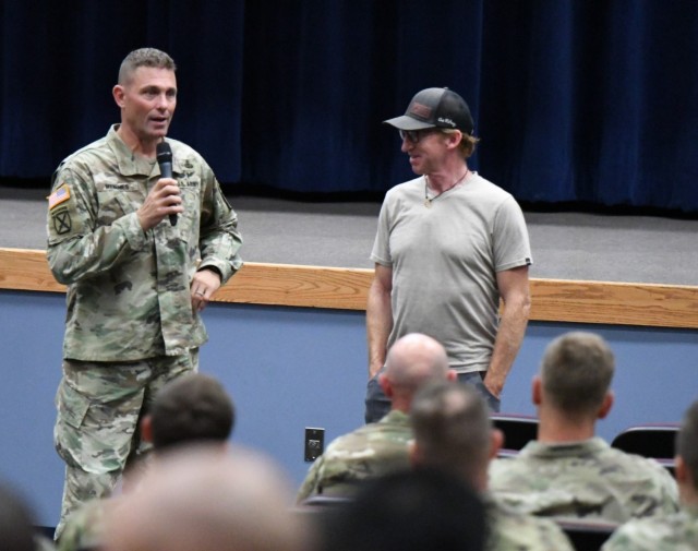 Maj. Gen. Brian J. Mennes, 10th Mountain Division (LI) and Fort Drum commander, leads the Q&A with filmmaker Chris Anthony after the screening of “Mission Mt. Mangart” on June 7 inside the Multipurpose Auditorium. (Photo by Mike Strasser, Fort Drum Garrison Public Affairs)