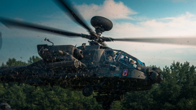 Hungarian Defense Force Brig. Gen. József Koller, the 86th Helicopter Base Garrison Commander, takes off for a leader orientation flight with U.S. Army Chief Warrant Officer 3 Joseph Lorman of the 12th Combat Aviation Brigade on June 3, 2021, during exercise Saber Guardian 21, part of the DEFENDER-Europe 21 series of exercises. Cross-training flights like these help to give allies a shared understanding of each other’s capabilities and enables interoperability and communication.