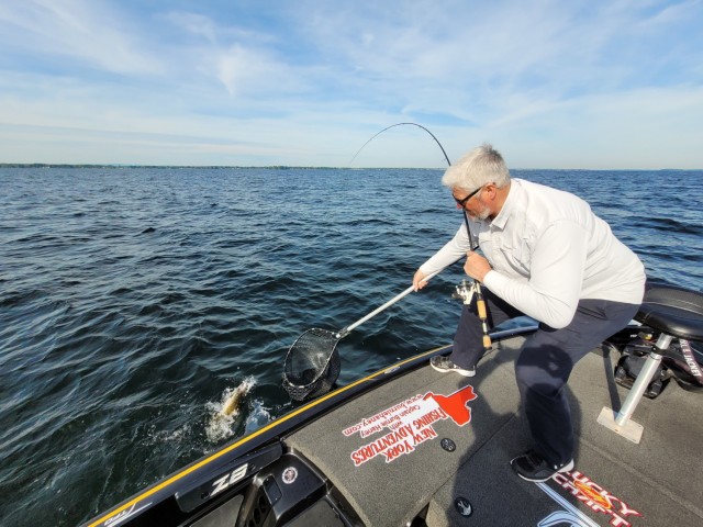 Burnie Haney, a local charter captain and 10th Mountain Division (LI) retiree, has a lifelong passion for angling, and he can often be found fishing from his boat in Lake Oneida. (Photo by Mike Strasser, Fort Drum Garrison Public Affairs)