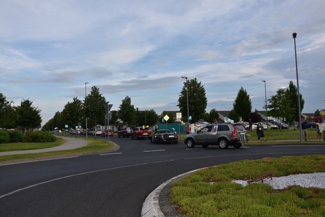 Following graduation the graduates and their families paraded through Newman village.