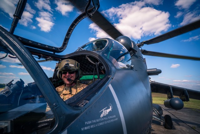 U.S. Army Lt. Col. Matthew Cole, commander of 1st battalion, 3rd aviation regiment, 12th Combat Aviation Brigade, spins up for a leader orientation flight in a Mi-24 Hind helicopter with Hungarian Defense Force Col. Zoltán Rolukó at Szolnok Air Base, Hungary on June 3, 2021, during exercise Saber Guardian 21, part of the DEFENDER-Europe 21 series of exercises. (U.S. Army photo by Maj. Robert Fellingham)



DEFENDER-Europe 21 is a large-scale U.S. Army-led exercise designed to build readiness and interoperability between the U.S., NATO allies, and partner militaries. This year, more than 28,000 multinational forces from 26 nations will conduct nearly simultaneous operations across more than 30 training areas in over a dozen countries from the Baltics to the strategically important Balkans and Black Sea Region. Follow the latest news and information about DEFENDER-Europe 21, visit www.EuropeAfrica.army.mil/DefenderEurope.