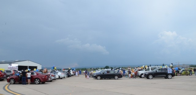 Families and guests of the WHS graduating class of 2021 lined up on the Wiesbaden Airfield in preparation for the ceremony.