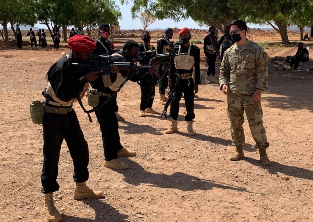 Sgt. 1st Class Jack Lincoln, an advisor with 2nd Battalion, 2nd Security Force Assistance Brigade, conducts preliminary marksmanship instruction with soldiers from the Djiboutian Battalion d’Intervention Rapide.